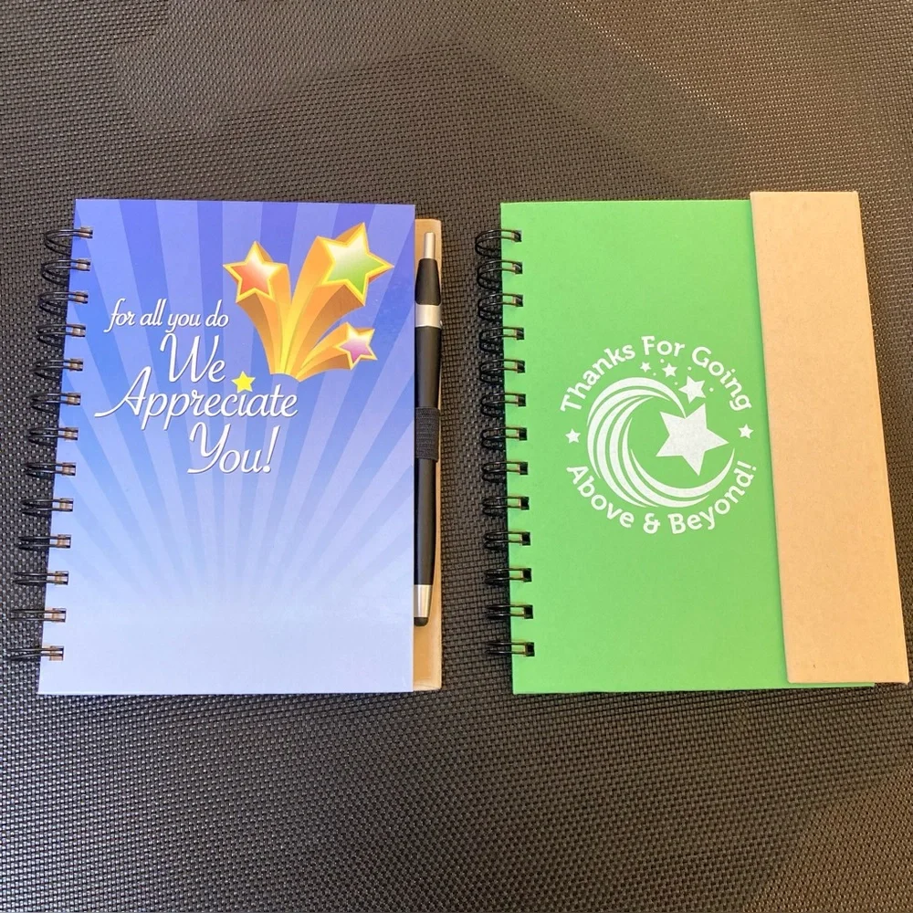 Set of Two Spiral “Thank You” Notebooks with Pens. 1 has multiple sticky notes